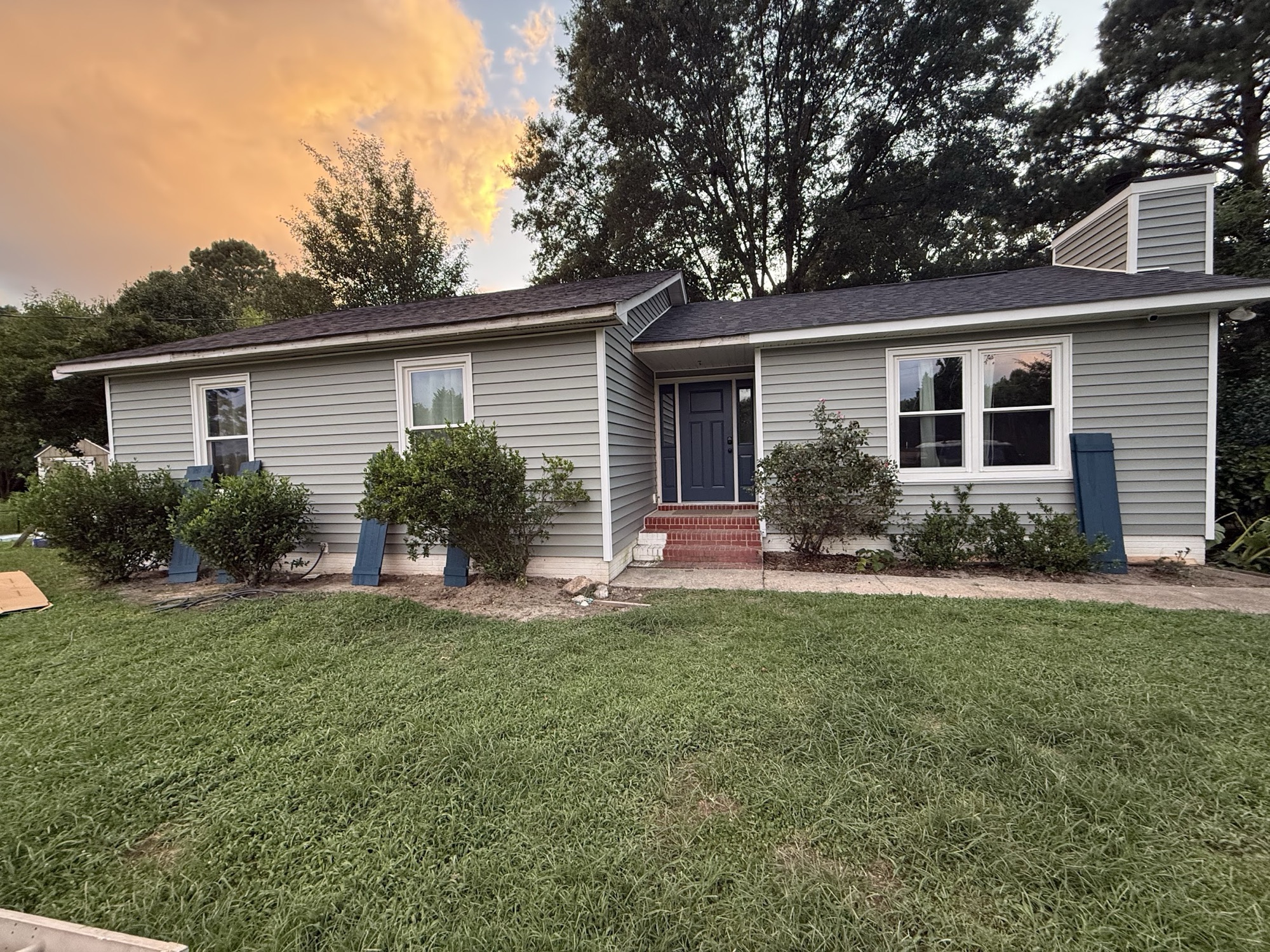 A full exterior refresh — new siding and trim transforming the curb appeal.